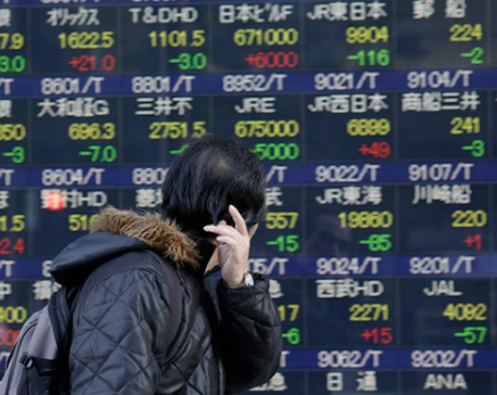 Asian markets mostly rise as dollar gains